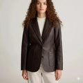 Women's dark brown leather blazer with two-button front and notch lapel