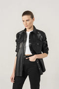 Women's black leather shirt jacket — snap-button overshirt with dual chest patch pockets