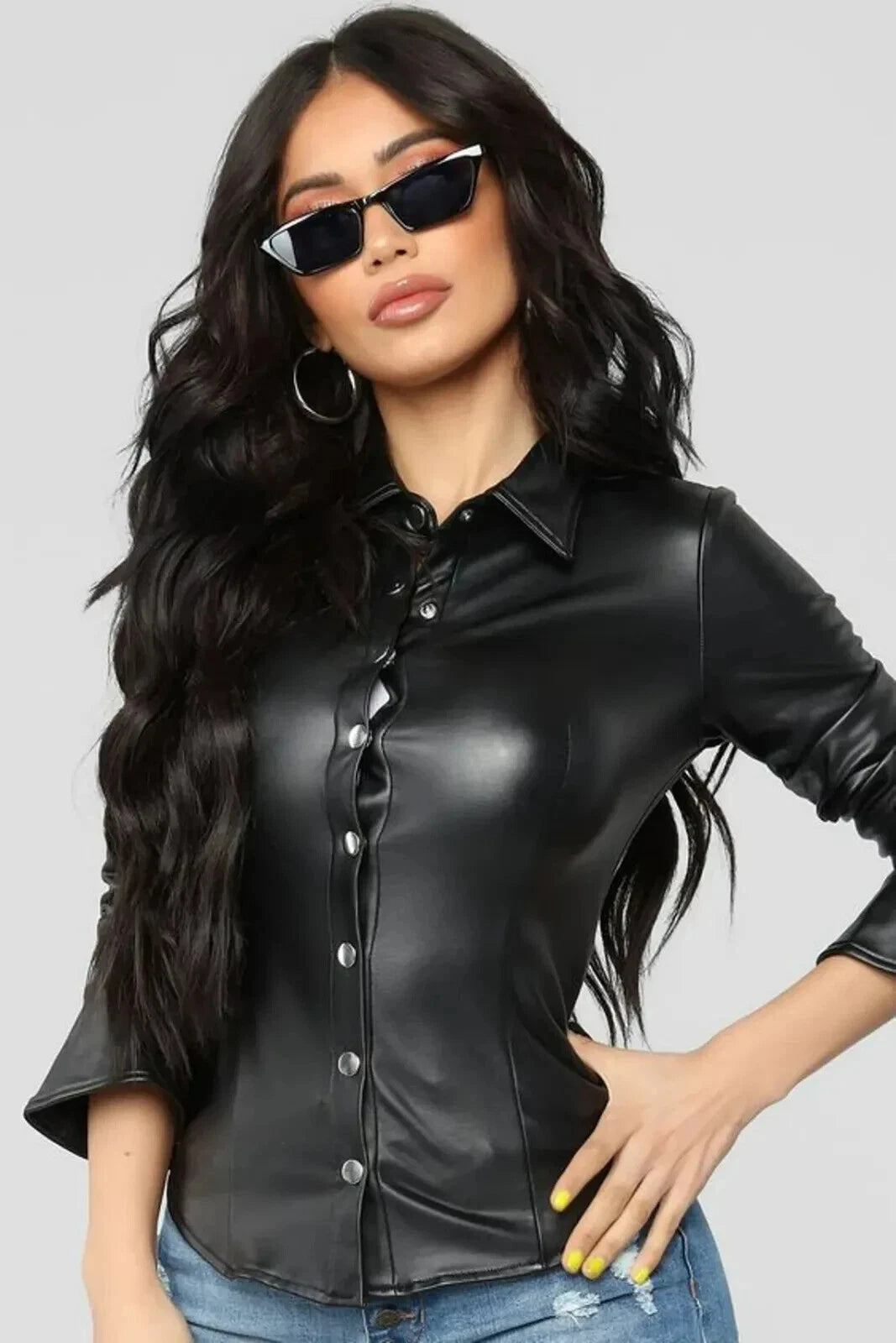 Women's black leather fitted shirt with silver snap buttons and sharp point collar