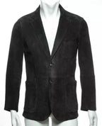 Black tailored blazer with notched lapel, two-button closure, chest pocket, and front flap pockets
