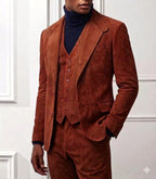 Rust-brown three-piece tailored suit with blazer, button-front waistcoat, and coordinated trousers