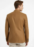 Front view of a tan tailored jacket with mandarin collar, three-button closure, and front pockets