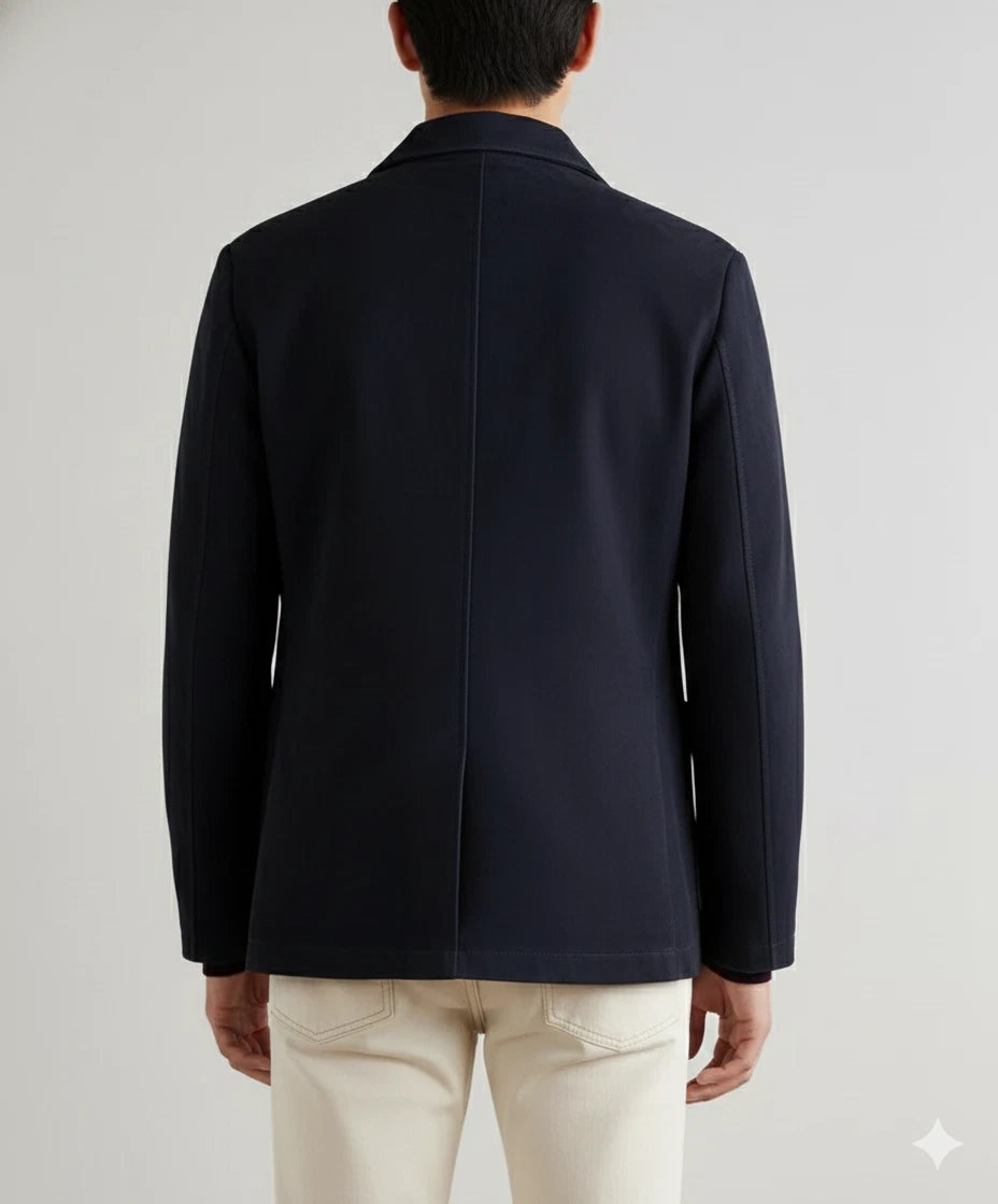 Front view of a navy blue casual tailored blazer with notched lapel and two-button closure