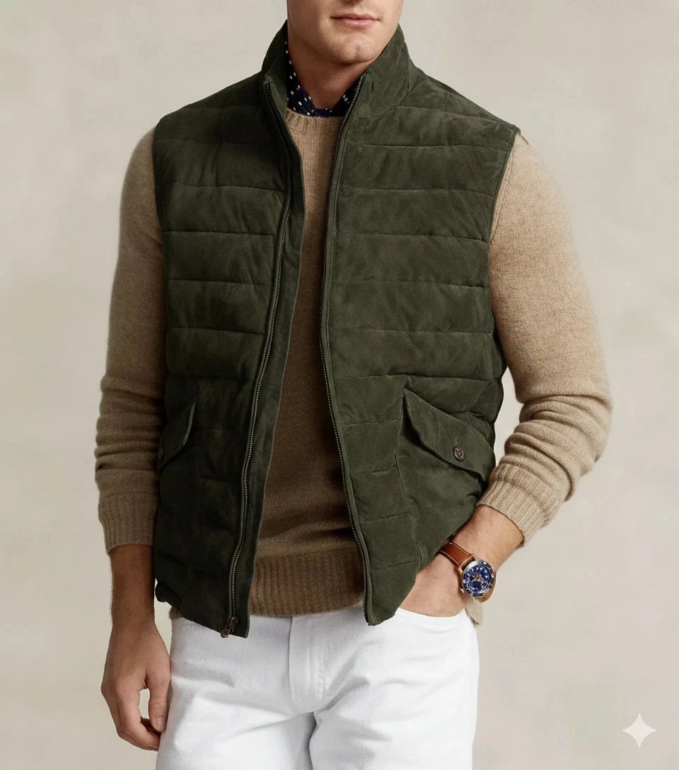 Front view of olive green quilted zip vest on model