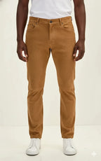 Front view of men's tan suede leather pants