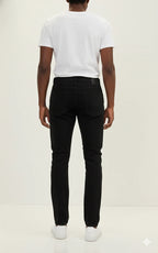 Back view of men's black suede leather pants